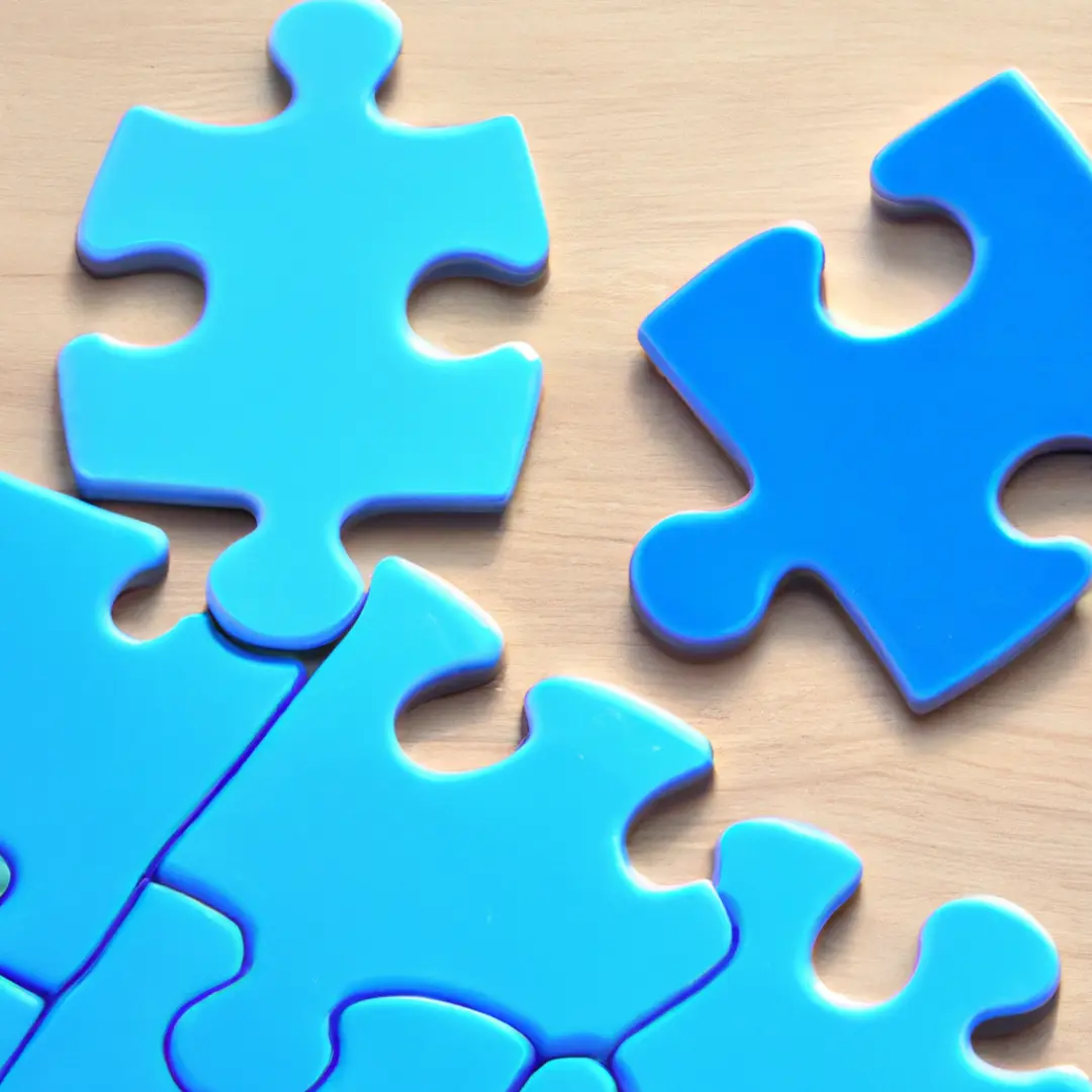 Alt-text: Two puzzle pieces fitting together, symbolizing the alignment of business strategies for growth.