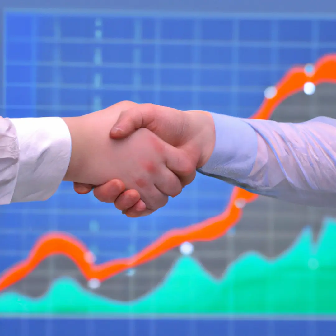 Two people shaking hands with a backdrop of graphs and charts, symbolizing business partnership.