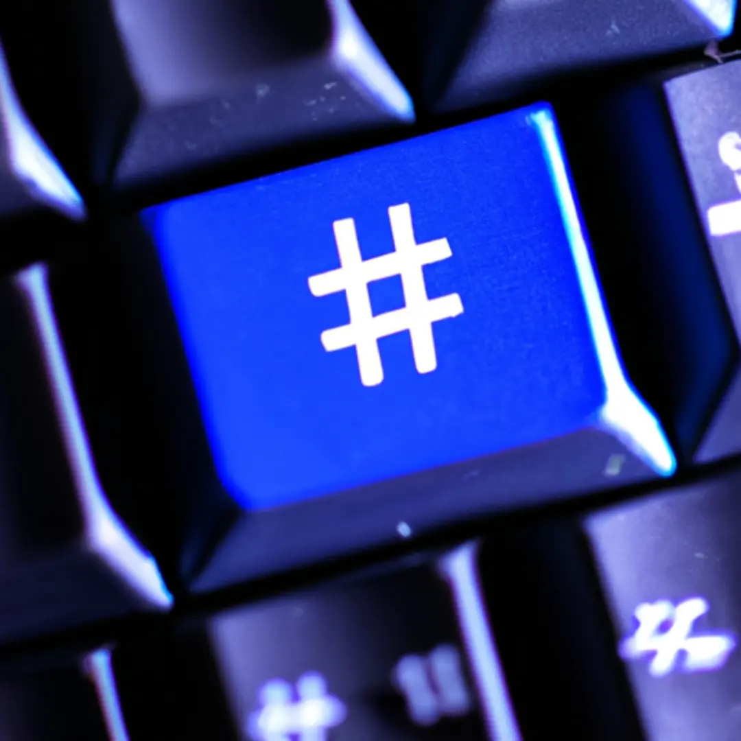 A keyboard with a prominently displayed hashtag symbol.